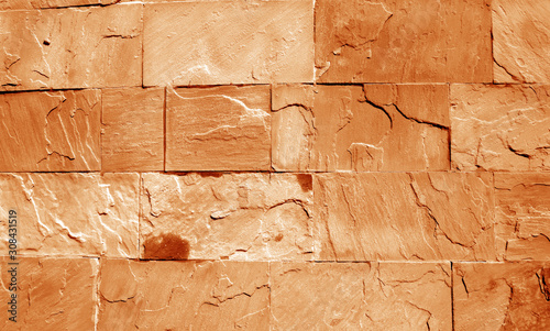 Sand stone wall in orange tone.