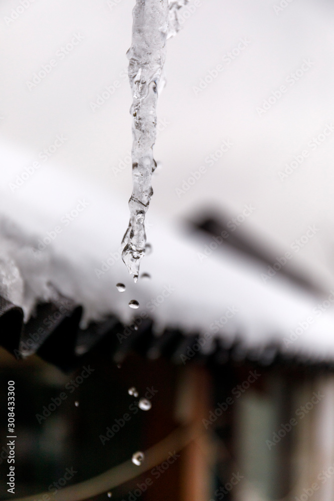 Waterdrop from ice in outdoor without sunshine. Waterdrop from ice in outdoor without sunshine.
