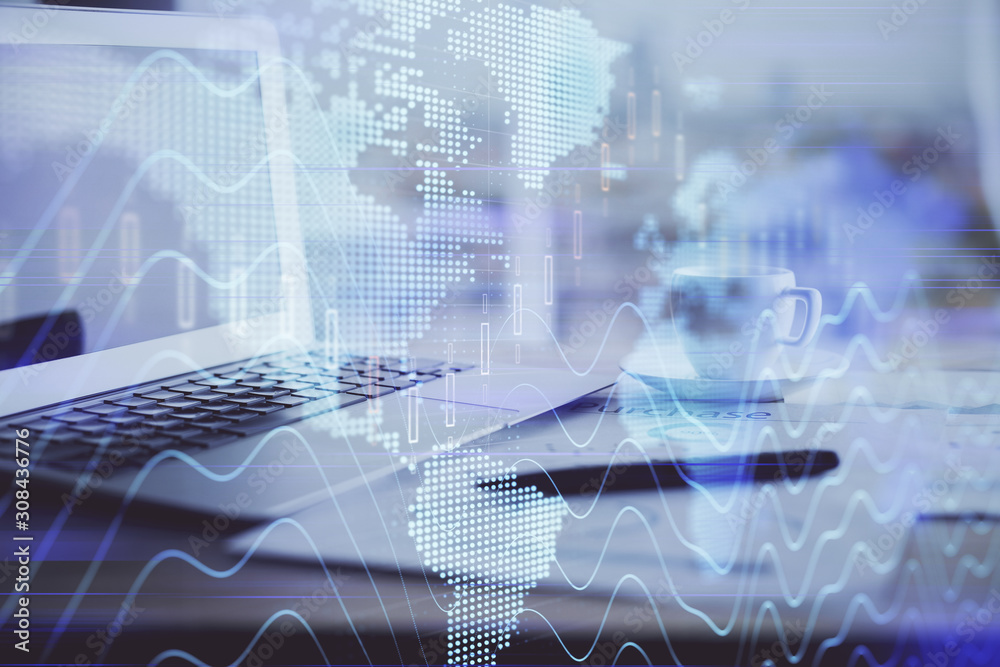 Obraz premium Forex graph hologram on table with computer background. Double exposure. Concept of financial markets.