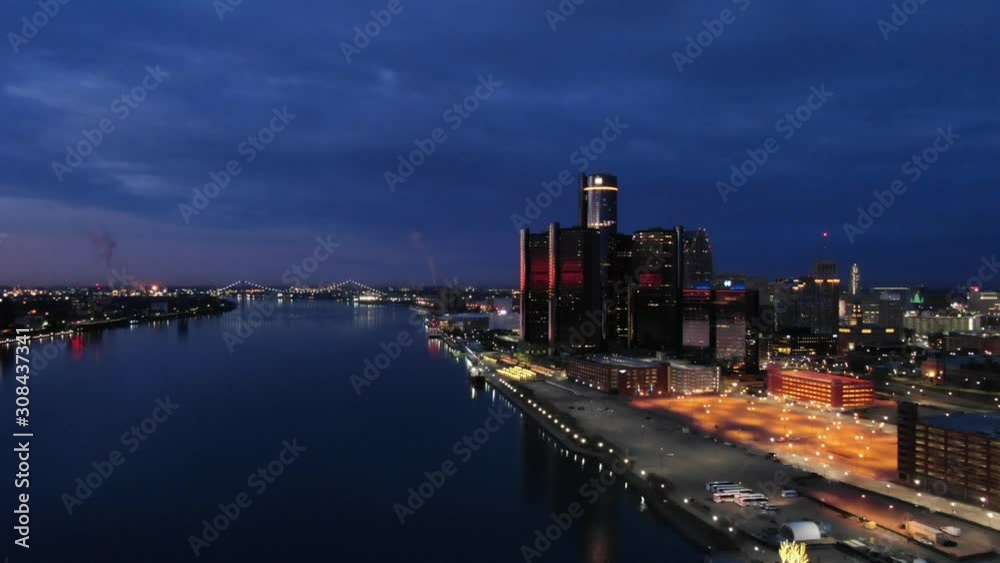 USA Michigan Detroit DJI Mavic flying over Detroit River / Downtown Detroit / Windsor on a dark, cold, winter, morning at Sunrise USA Michigan Detroit DJI Mavic flying over Detroit River / Downtown Detroit / Windsor on a dark, cold, winter, morning at Sunrise