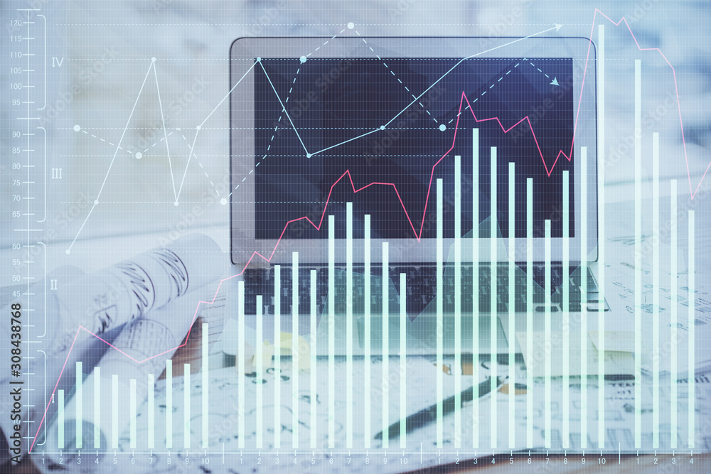 Financial graph colorful drawing and table with computer on background. Multi exposure. Concept of international markets. Financial graph colorful drawing and table with computer on background. Multi exposure. Concept of international markets.