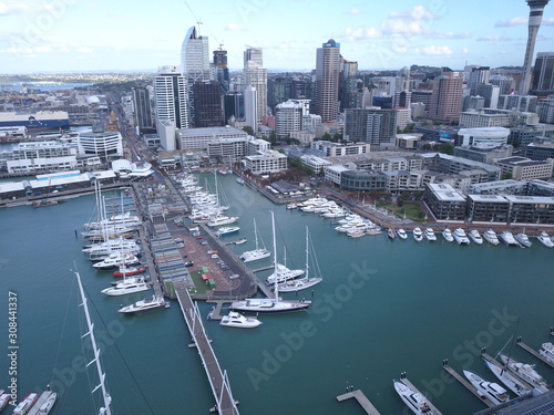 Viaduct Basin, Auckland / New Zealand - December 9, 2019: The beautiful scene surrounding the Viaduct harbour, marina bay, Wynyard, St Marys Bay and Westhaven, all of New Zealand’s North Island photo