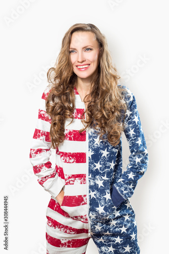 portrait of young woman in american flag home wear isolated over white