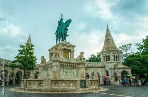 Monument to King Matthias against the background of the towers of the Fisherman's Bastion in Budapest