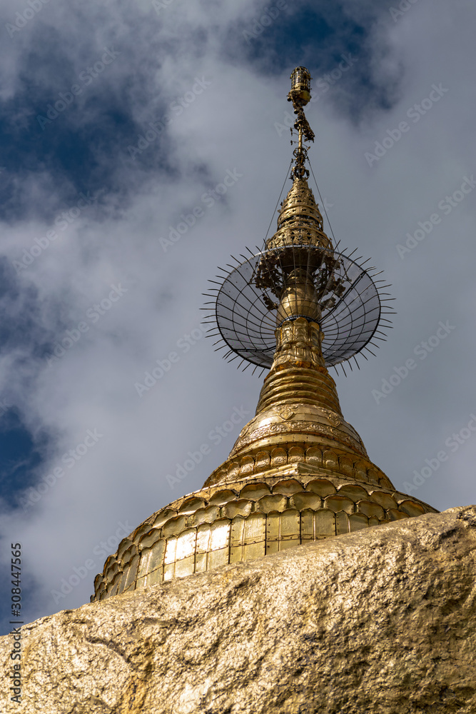 Gilded stupa at one of the temples in the Kyaiktiyo Pagoda temple complex, Myanmar.