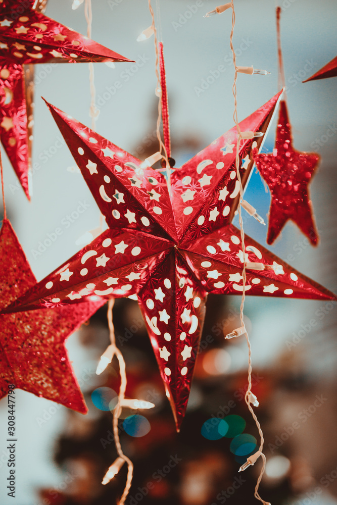 Christmas decorations at home. Red Chinese stars with lights Christmas decorations at home. Red Chinese stars with lights