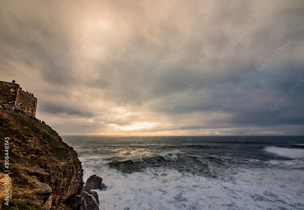 Nazare, Portugal: Nov 15, 2019: massive waves as seen from Nazare Lighthouse in Nazare, Portugal