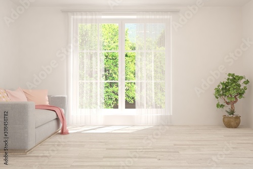 Stylish room in white color with sofa and summer landscape in window. Scandinavian interior design. 3D illustration