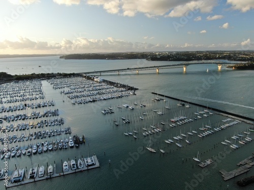 Viaduct Basin, Auckland / New Zealand - December 9, 2019: The beautiful scene surrounding the Viaduct harbour, marina bay, Wynyard, St Marys Bay and Westhaven, all of New Zealand’s North Island photo