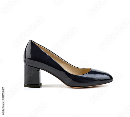black patent leather women heels white background side view.