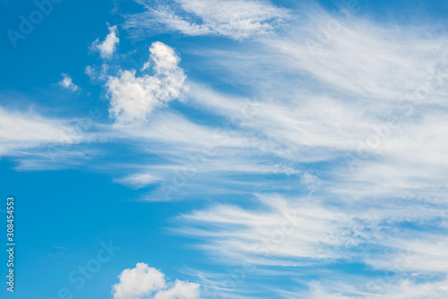 Natural blue sky with cloud closeup or background.