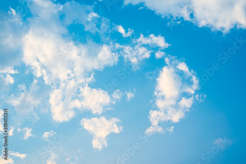Natural blue sky with cloud closeup or background. © piyaphong