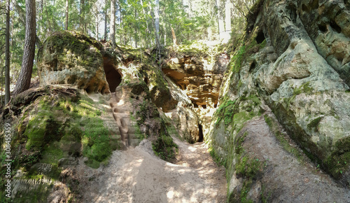 Licu Langu Sandstone Cliffs. The Big Langu Cave. Sand Formations at Lode Behind Cesis in Latvia.
