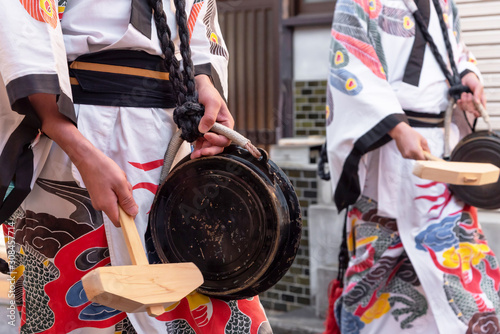 Detail of japanese people wearing traditional clothes during annual Takayama festival. Takayama, Japan