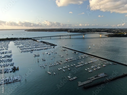 Viaduct Basin, Auckland / New Zealand - December 9, 2019: The beautiful scene surrounding the Viaduct harbour, marina bay, Wynyard, St Marys Bay and Westhaven, all of New Zealand’s North Island photo