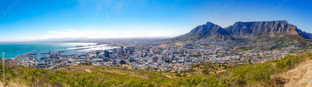 Panoramic view over Cape Town, Devil's Peak and Table Mountain from Signal Hill on a sunny day, South Africa