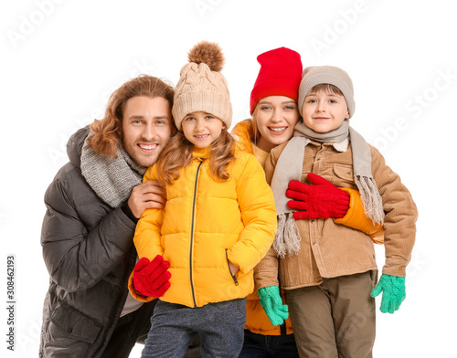 Happy family in winter clot...