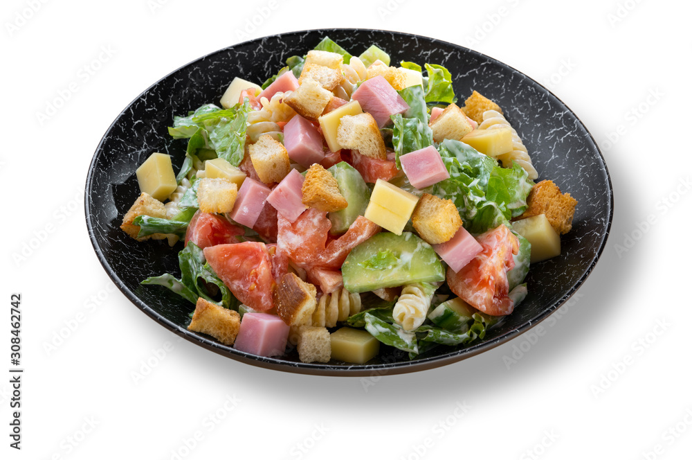 Fresh Italian salad with pasta in beautiful black modern plate Fresh Italian salad with pasta in beautiful black modern plate