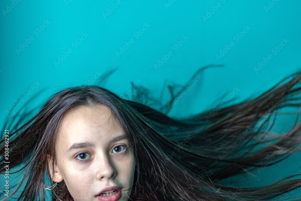 Fototapeta premium Studio photo of a young girl, distant look
