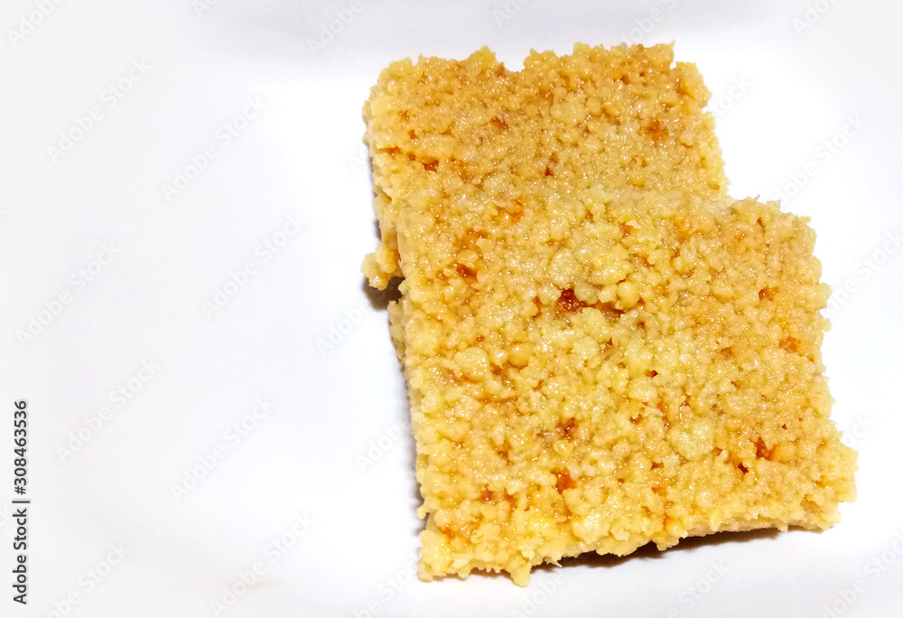 Indian Diwali Sweet Food Kalakand Also Know as Halwa or Mawa Kalakand is a Creamy Delicacy Made From Paneer or Cottage Cheese, The Dish Originated in Alwar, Rajasthan. Indian Diwali Sweet Food Kalakand Also Know as Halwa or Mawa Kalakand is a Creamy Delicacy Made From Paneer or Cottage Cheese, The Dish Originated in Alwar, Rajasthan.