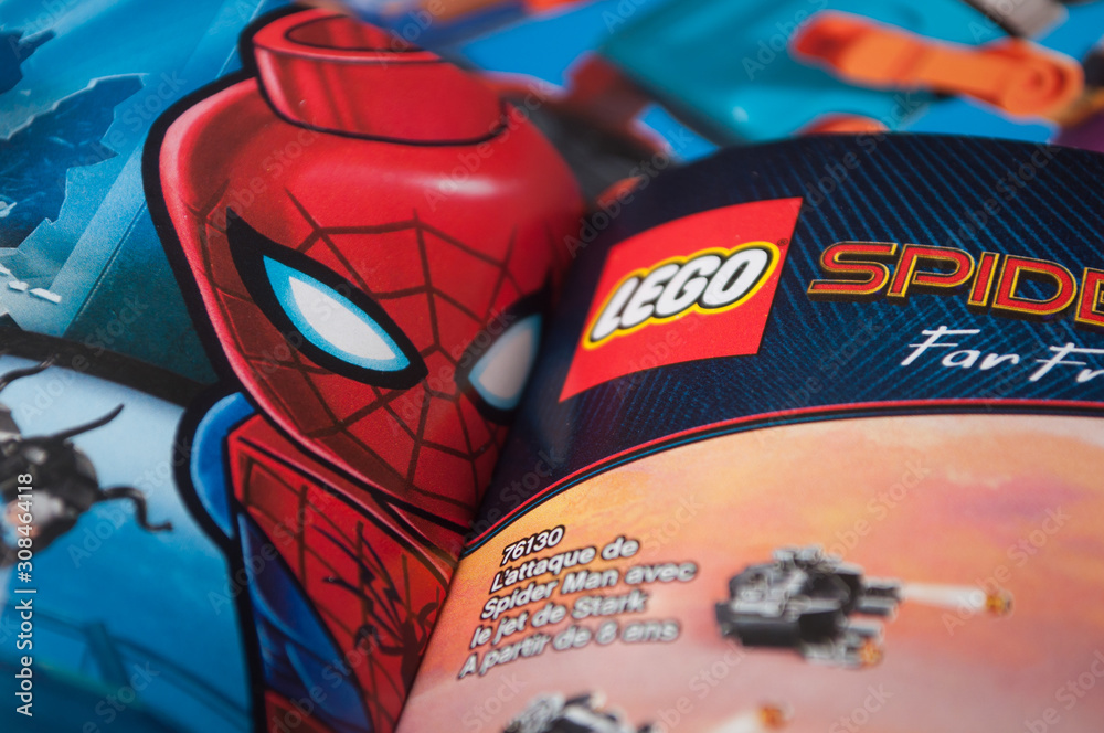Obraz premium Mulhouse - France - 9 December 2019 - Closeup of spider man super hero and lego logo on Lego toys catalog