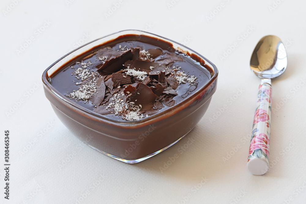 Supangle (pudding) dessert in glass bowl, on white background. Supangle (pudding) dessert in glass bowl, on white background.