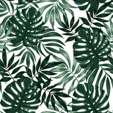 Trending tropical pattern with plants and leaves on a white background. Illustration in Hawaiian style. Jungle leaves. Botanical pattern. Summer background with exotic leaves. 