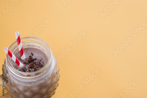 Chocolate smoothie on fluor color background