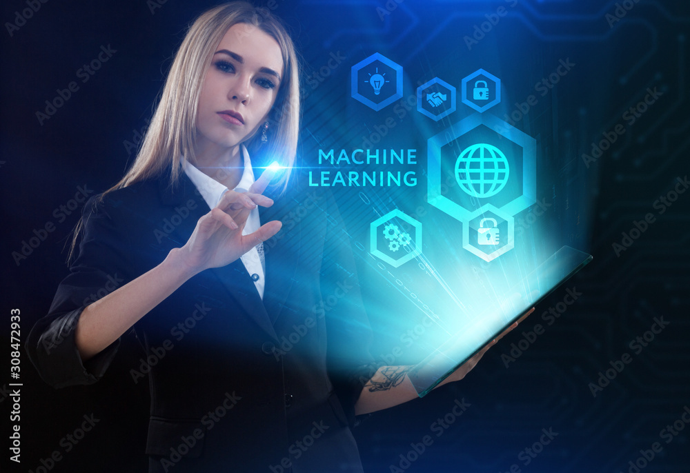 Business, Technology, Internet and network concept. Young businessman working on a virtual screen of the future and sees the inscription: Machine learning Business, Technology, Internet and network concept. Young businessman working on a virtual screen of the future and sees the inscription: Machine learning