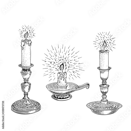 Candle sketch. A set of different candles in an old candlestick. Hand drawn vector illustration