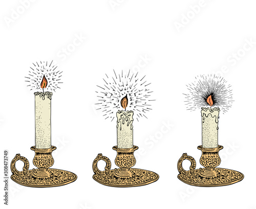Candle sketch set. Hand drawn vector illustration of a burning candle with rays of light in vintage style