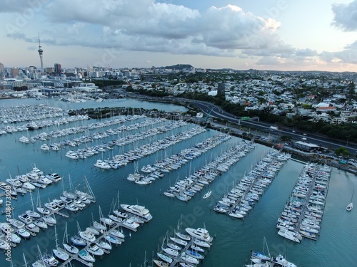 Viaduct Basin, Auckland / New Zealand - December 9, 2019: The beautiful scene surrounding the Viaduct harbour, marina bay, Wynyard, St Marys Bay and Westhaven, all of New Zealand’s North Island photo