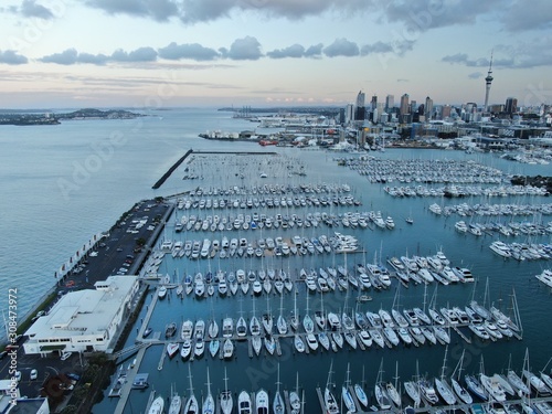 Viaduct Basin, Auckland / New Zealand - December 9, 2019: The beautiful scene surrounding the Viaduct harbour, marina bay, Wynyard, St Marys Bay and Westhaven, all of New Zealand’s North Island photo