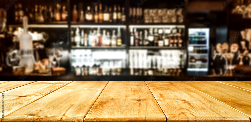 Wooden desk of bar and free space for your decoration.  - obrazy, fototapety, plakaty 