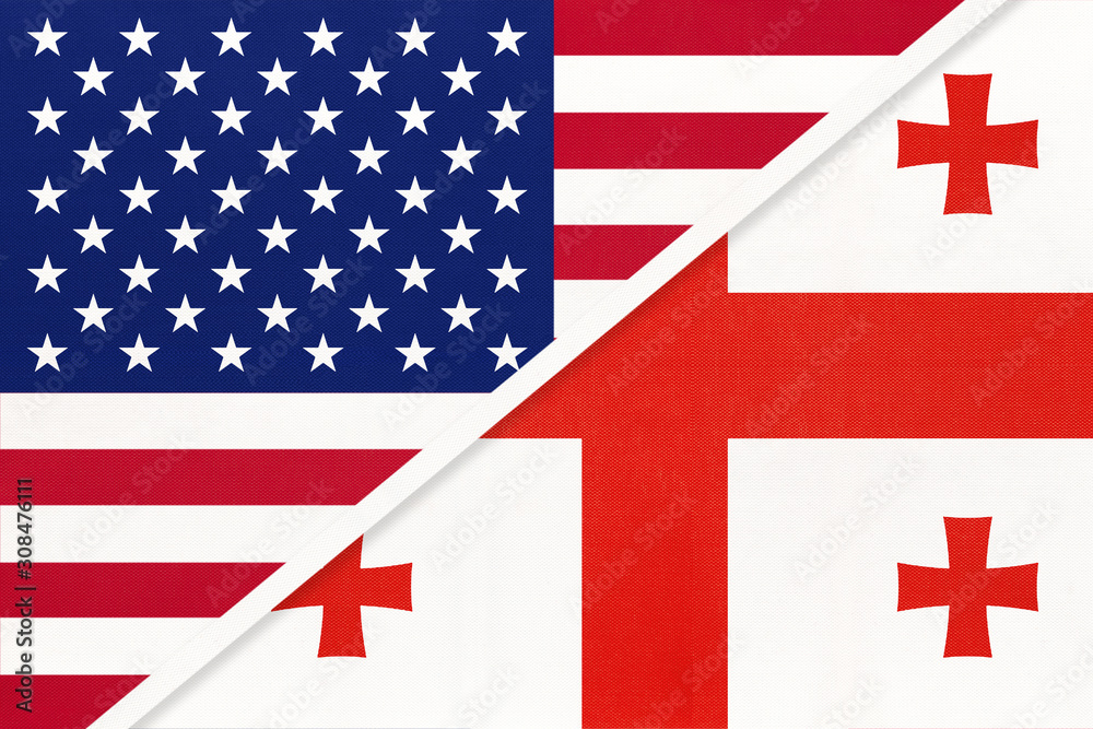 Obraz premium USA vs Georgia national flag from textile. Relationship between two american and asian countries.