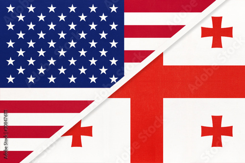 USA vs Georgia national flag from textile. Relationship between two american and asian countries.