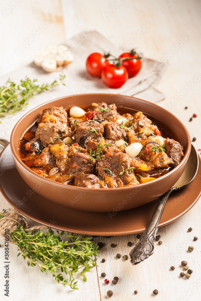 Braised meat with vegetables in a thick sauce. Braised meat with vegetables in a thick sauce.