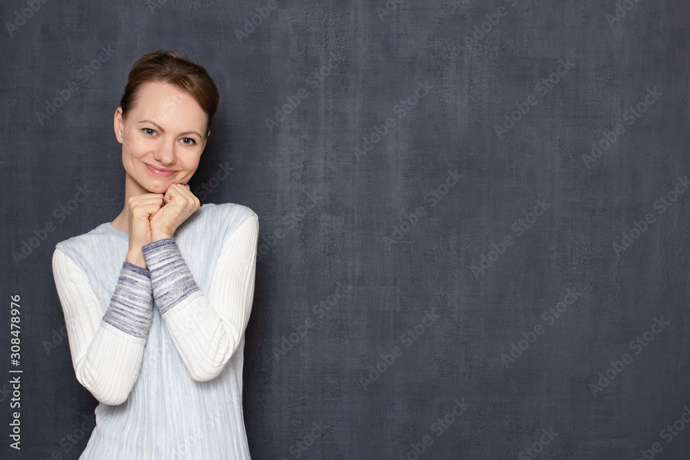 Portrait of happy satisfied young woman being in anticipation Portrait of happy satisfied young woman being in anticipation
