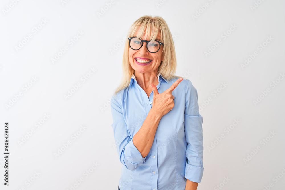 Middle age businesswoman wearing elegant shirt and glasses over isolated white background cheerful with a smile on face pointing with hand and finger up to the side with happy and natural expression