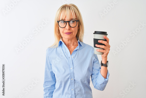 Middle age businesswoman wearing glasses drinking coffee over isolated white background with a confident expression on smart face thinking serious