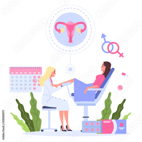 Woman sitting in gynecology chair and having the examination photo