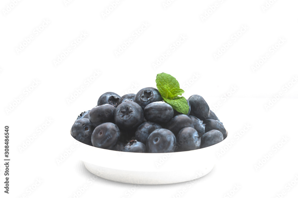 Fresh blueberries on a white background