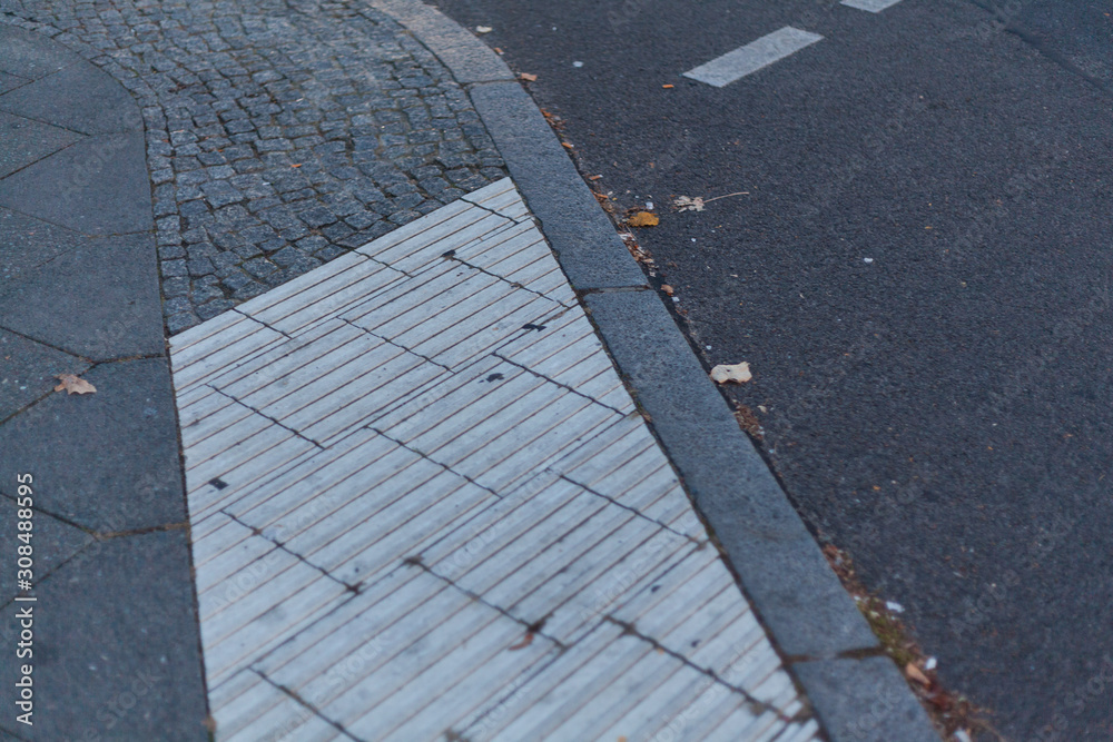 Fototapeta premium intersection with pedestrian crossing and guidance system in Berlin