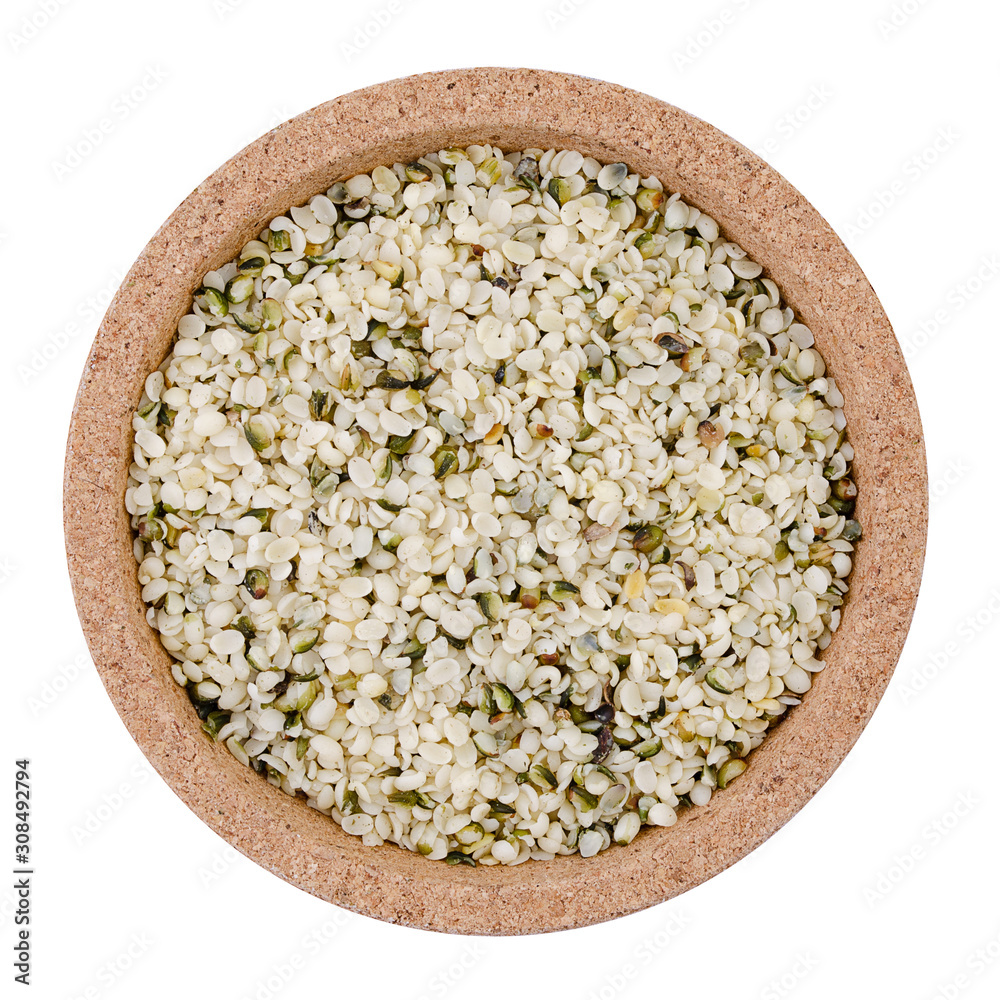 Cannabis seeds on a plate on a white background Cannabis seeds on a plate on a white background