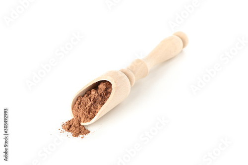 Scoop with cocoa powder isolated on white background