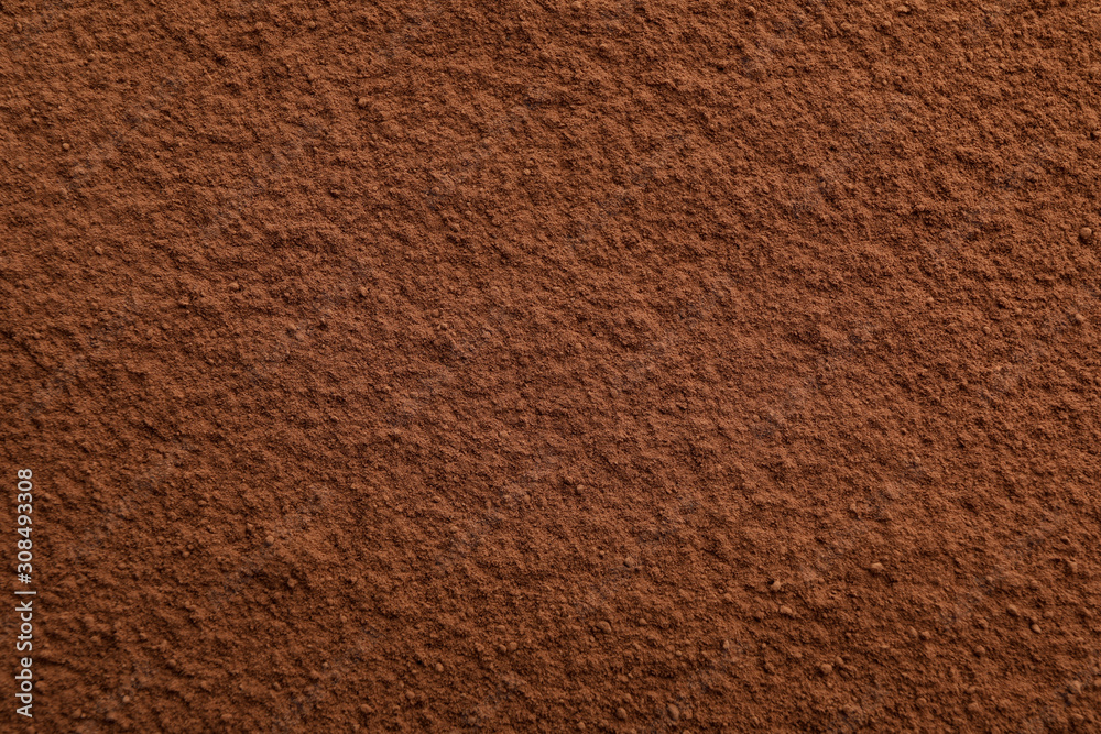 Cocoa powder textured background, close up and space for text Cocoa powder textured background, close up and space for text