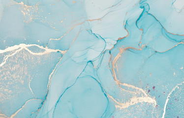 Alcohol ink colors translucent. Abstract multicolored marble texture background. Design wrapping paper, wallpaper. Mixing acrylic paints. Modern fluid art.