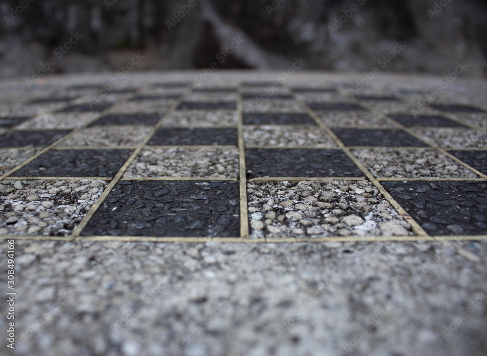 The detail of a chess table of a outdoor park