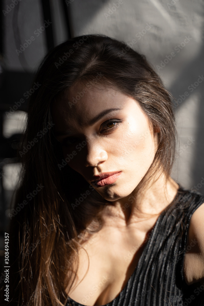 Close up of young beautiful dark-haired girl