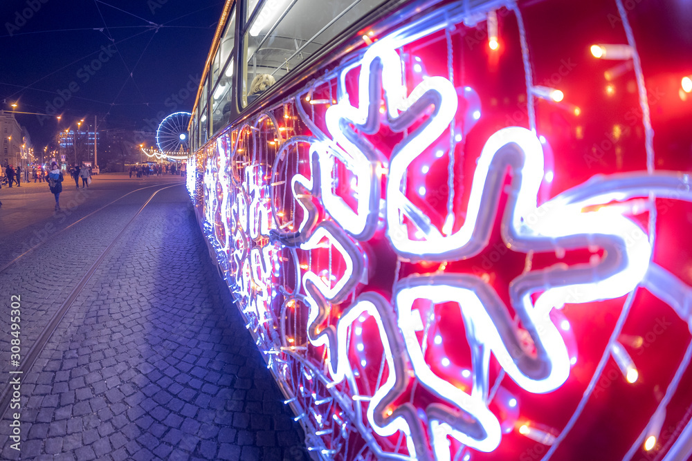 Christmas special tram illuminated by light with Christmas motif in Brno on  traditional Moravian markets. Stock Photo | Adobe Stock